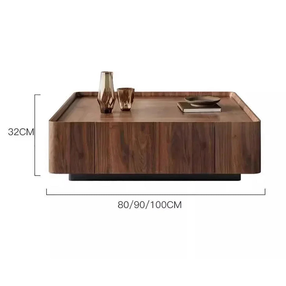 Wooden coffee table with decorative items and dimensions on a white background