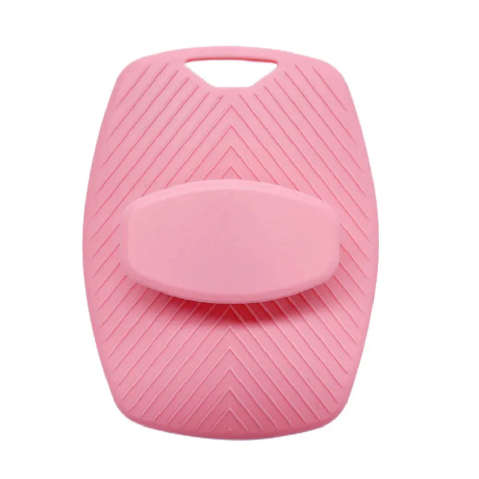 Pink textured key cover on a white background