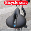 Bicycle seat with text highlighting features on a blurred background