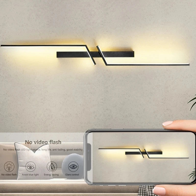 Modern wall lights with a smartphone displaying a similar design on a neutral background