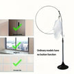 Floor lamp with feather attachment and text about button function on a white background