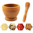 Mortar and pestle with images of spices on a white background