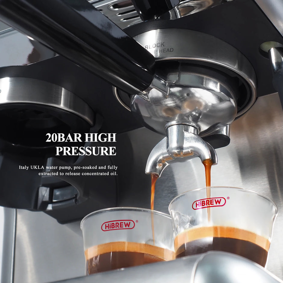 Coffee being brewed into a glass with a visible Hibrew logo, featuring 20bar high pressure.