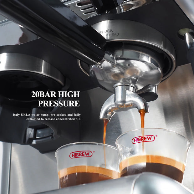 Coffee being brewed into a glass with a visible Hibrew logo, featuring 20bar high pressure.