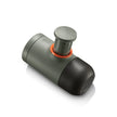 Gray and black cylindrical device with a red ring on a white background
