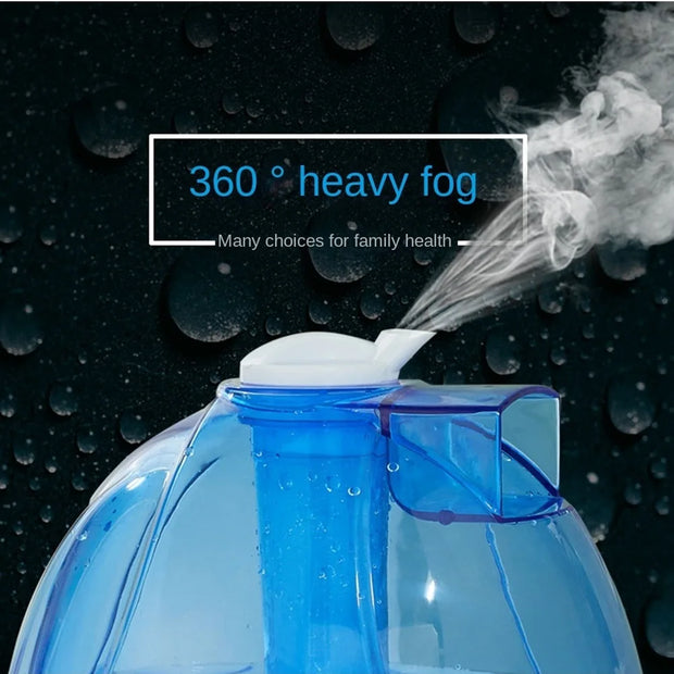 Blue humidifier emitting mist with text '360° heavy fog' on a dark background