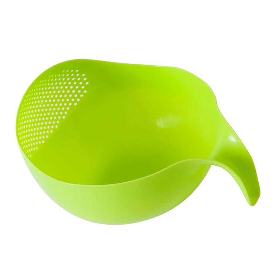 Green plastic strainer on a white background