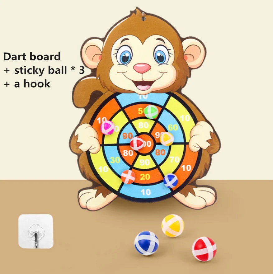 Children's dart board with monkey design on a beige background