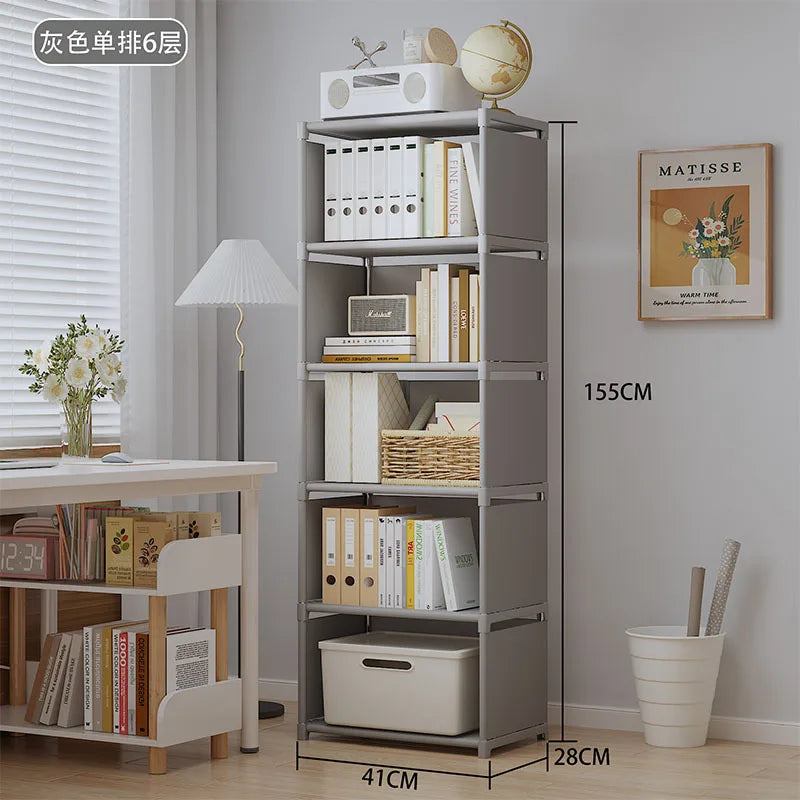 Gray bookshelf with books and decor items in a room setting