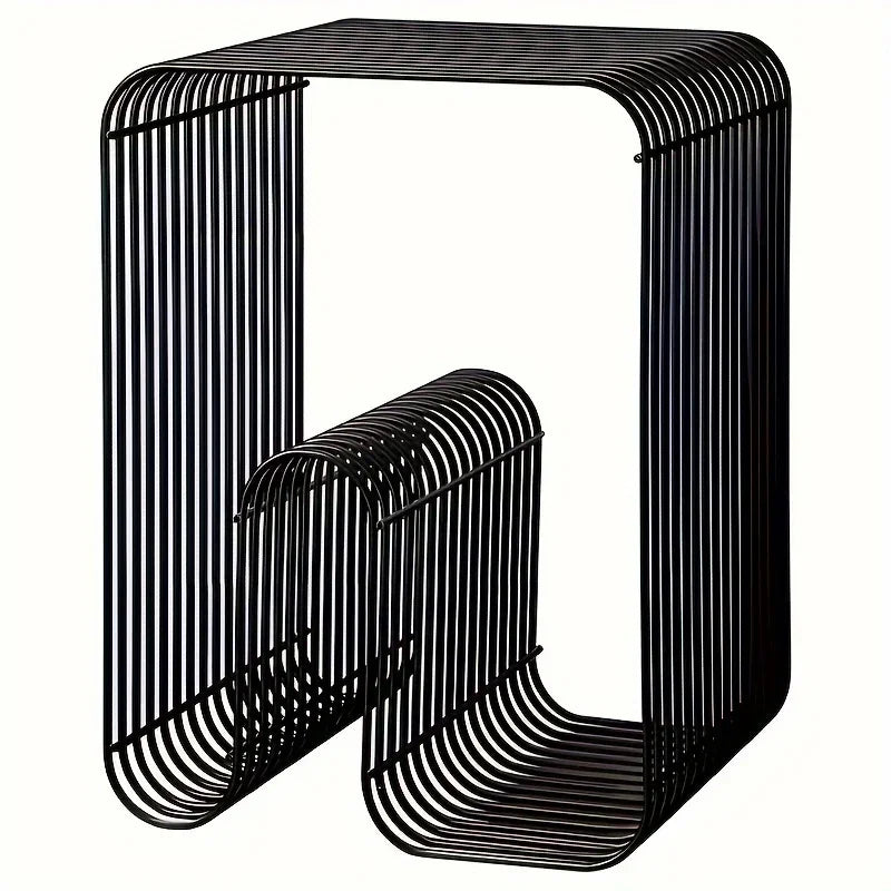 Black metal side table with a modern design on a white background