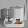 Pet feeder with water dispenser on a gray surface