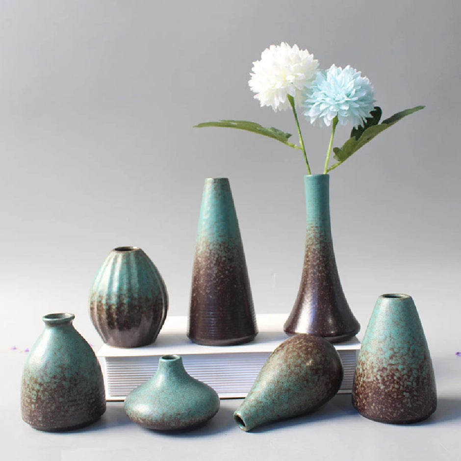 Set of ceramic vases with a gradient finish on a gray background