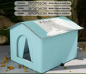 Light blue pet house with size chart on a blurred background