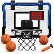 Mini basketball hoop set with three basketballs and a pump on a white background