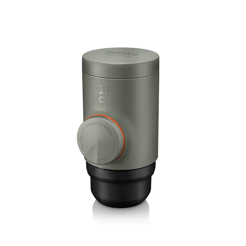Gray and black container with a circular component on a white background