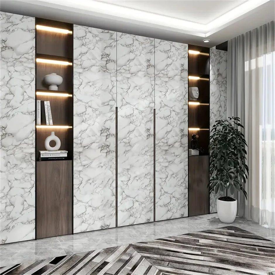 Modern interior design with marble-patterned wall panels and wooden shelves.