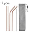 Set of rose gold straws and cleaning brush with a mesh storage bag on a white background, branded 'Upors'.