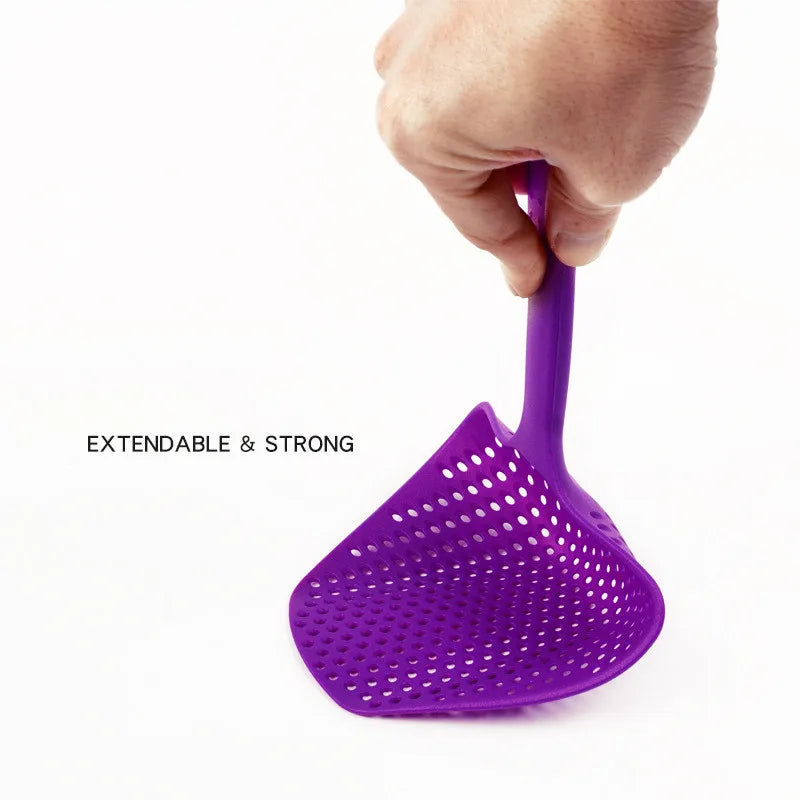 Purple extendable strainer held by a hand on a white background