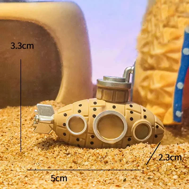Small submarine model on sand with measurements indicated