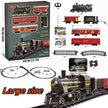 Toy train set with packaging, tracks, and accessories on a white background