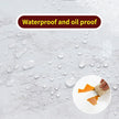 Text 'Waterproof and oil proof' over a surface with water droplets and a hand using a sponge.