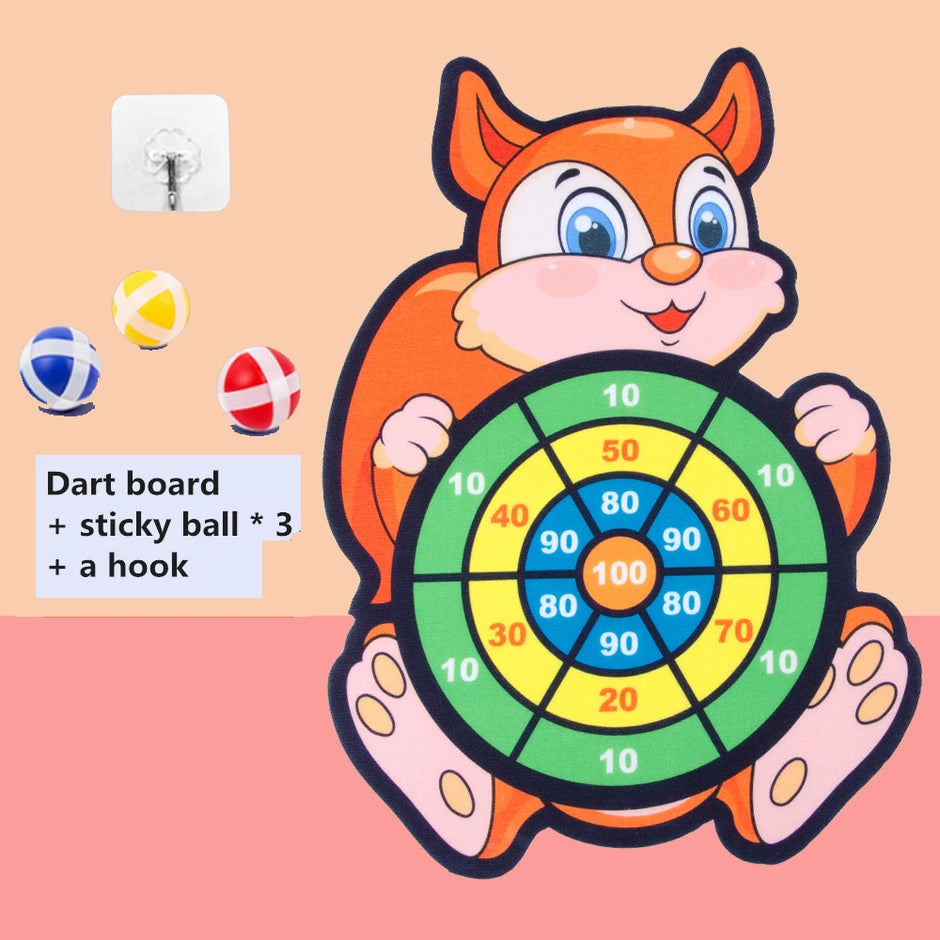 Children's dart board with cartoon fox design on a pink background