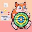 Children's dart board with cartoon fox design on a pink background