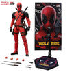 Deadpool action figure with accessories and packaging on a white background