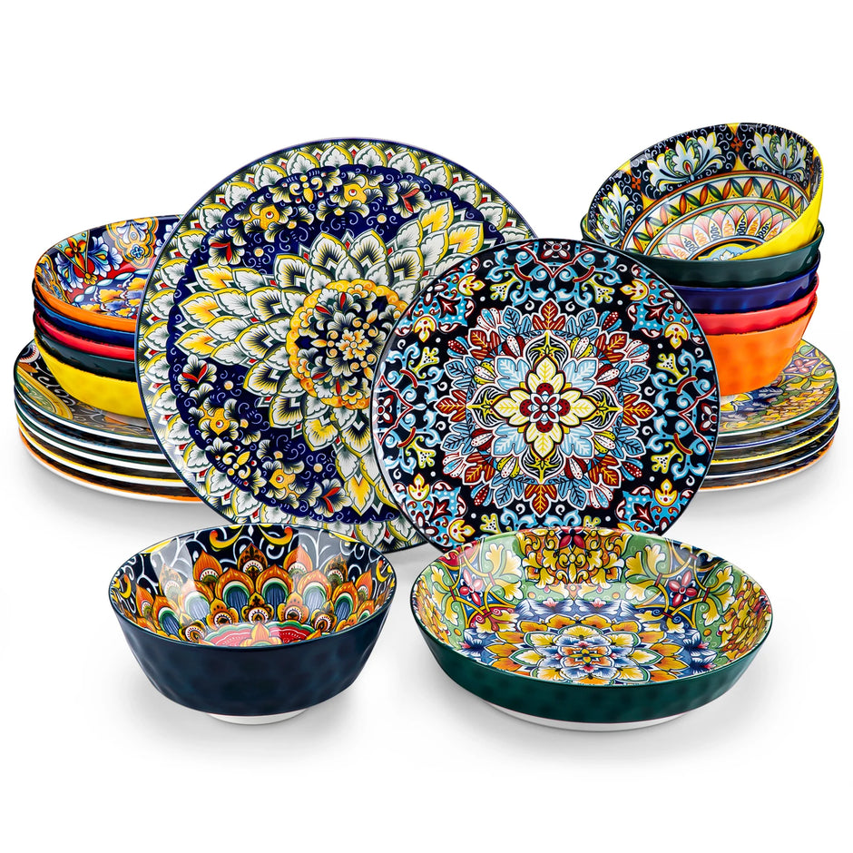 Set of colorful ceramic plates with floral patterns on a white background
