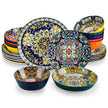 Set of colorful ceramic plates with floral patterns on a white background