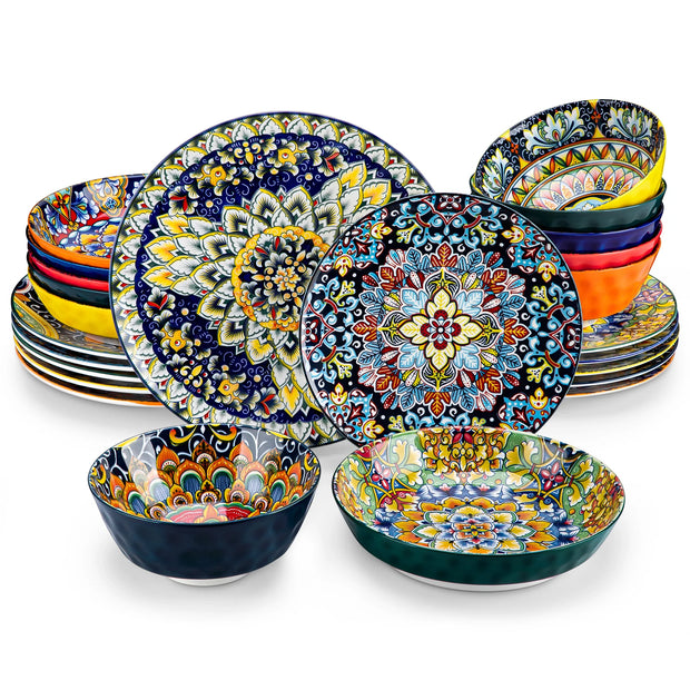 Set of colorful ceramic plates with floral patterns on a white background