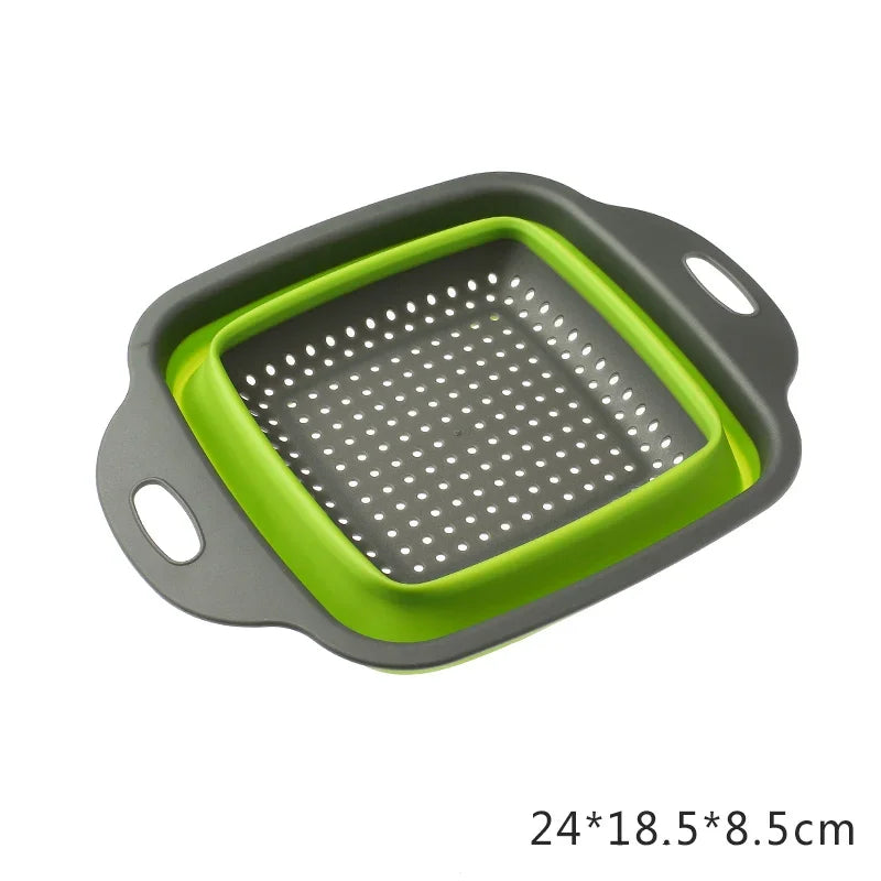 Collapsible colander with green interior and gray exterior on a white background
