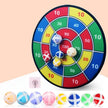 Colorful dartboard game with darts on a light pink background
