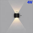 Black wall-mounted light fixture with dimensions and power rating on a gray background