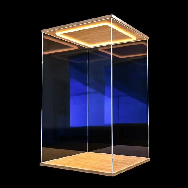 Clear glass display case with wooden base and top on a black background