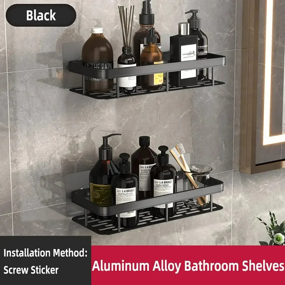 Black aluminum alloy bathroom shelves with toiletries against a tiled wall.