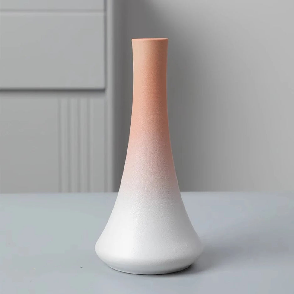 Gradient ceramic vase on a neutral background