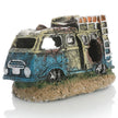 Decorative miniature van with a textured surface on a white background