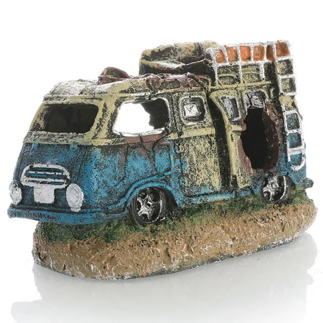 Decorative miniature van with a textured surface on a white background