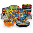 Set of colorful ceramic plates and bowls with intricate patterns on a white background