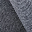 Close-up of textured gray carpet with a diagonal pattern