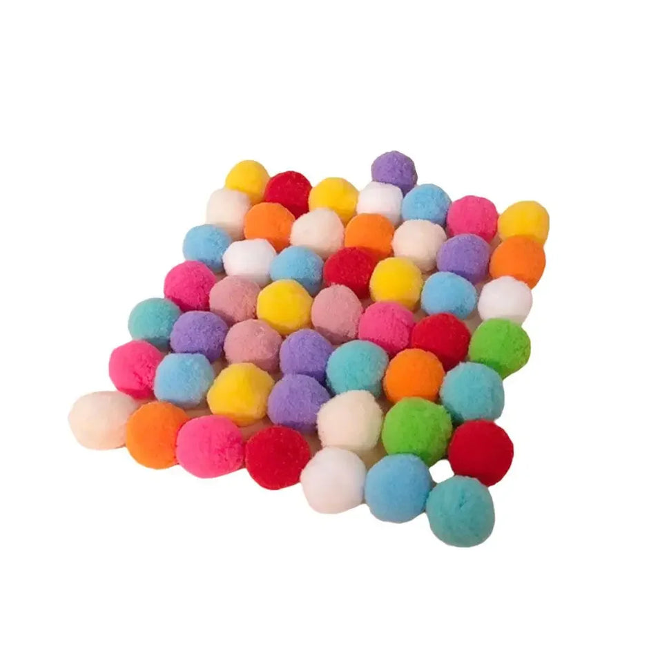 Multicolored pom-pom rug on a white background
