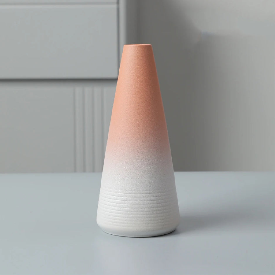 Gradient ceramic vase on a neutral background