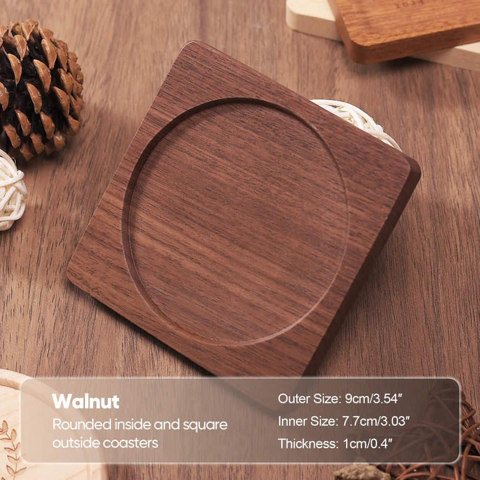 Wooden coaster with rounded inside and square outside design on a wooden surface.