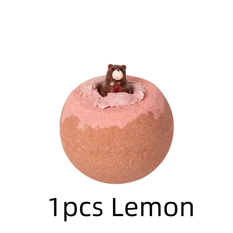 Bath bomb with a bear figurine on top, labeled '1pcs Lemon' on a white background
