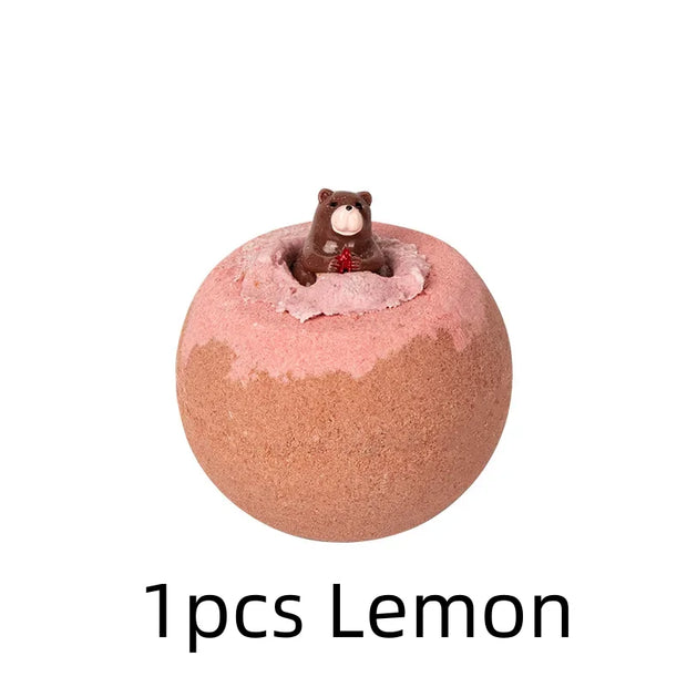 Bath bomb with a bear figurine on top, labeled '1pcs Lemon' on a white background