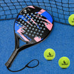 Paddle and balls on a blue surface with a racket string