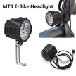 MTB E-Bike Headlight with additional light and wiring on a white background