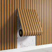 Wooden blind with vertical slats on a striped background