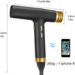 Black and gold hair dryer with measurements and smartphone comparison on a white background